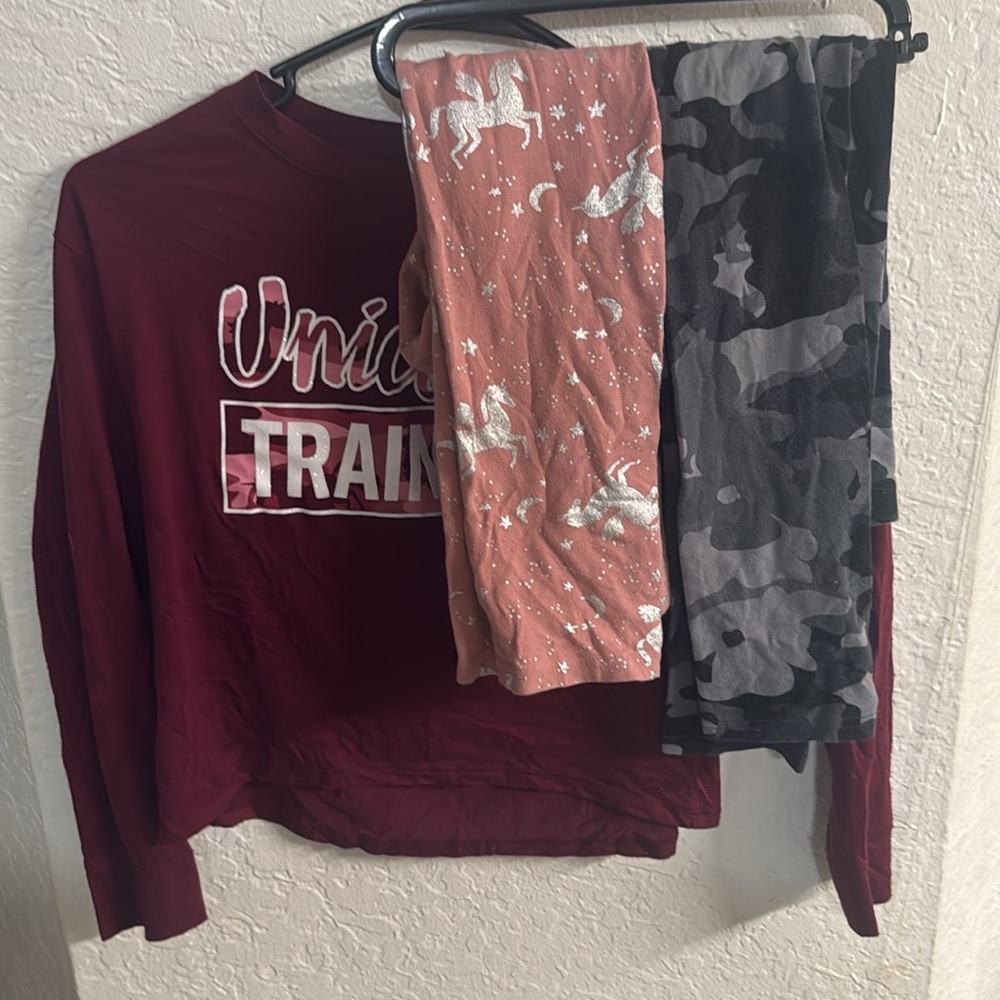 Girls size 8 long sleeve shirt and two leggings.